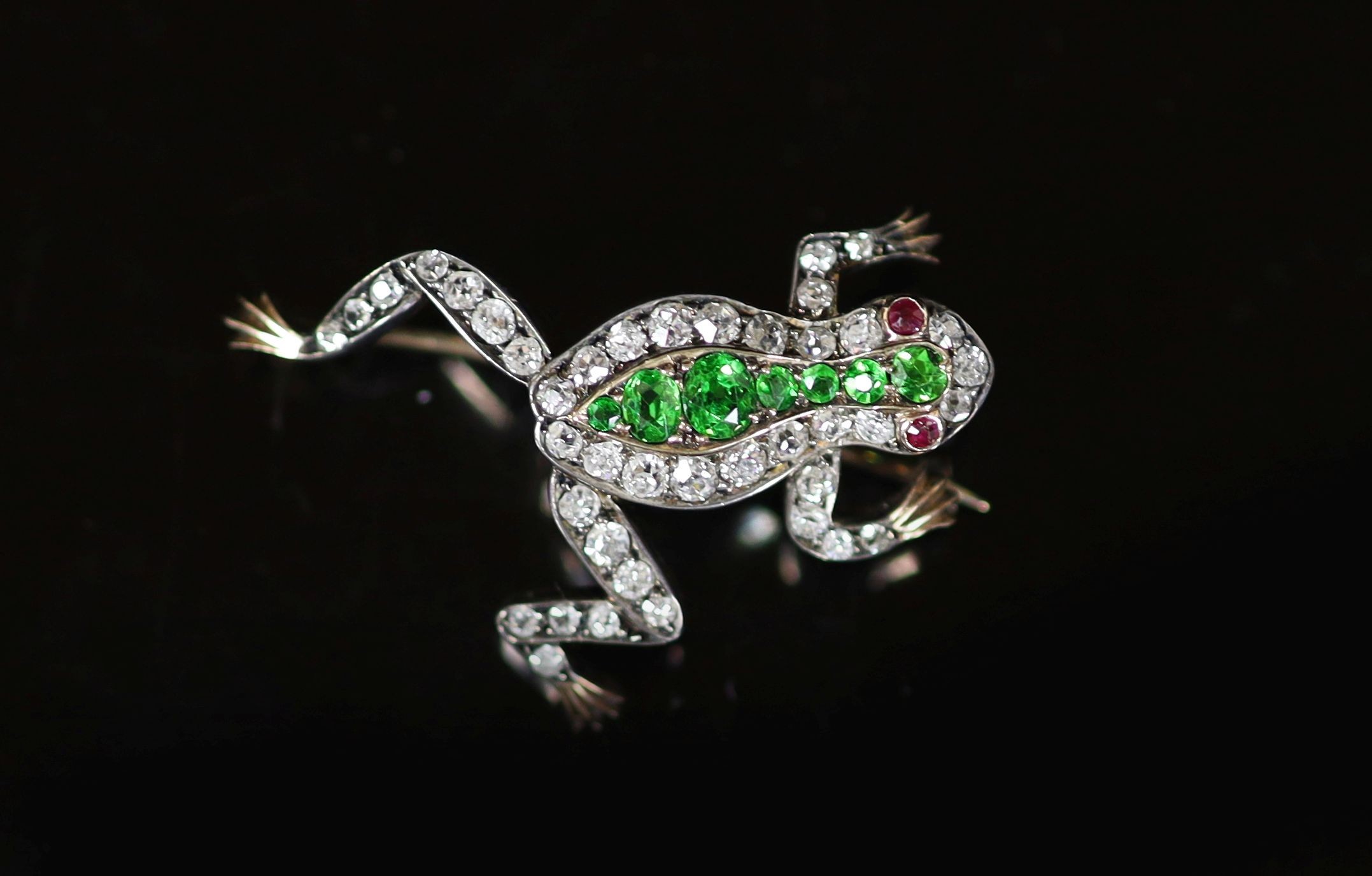 A late Victorian gold and silver, diamond and demantoid garnet cluster set brooch, modelled as a frog